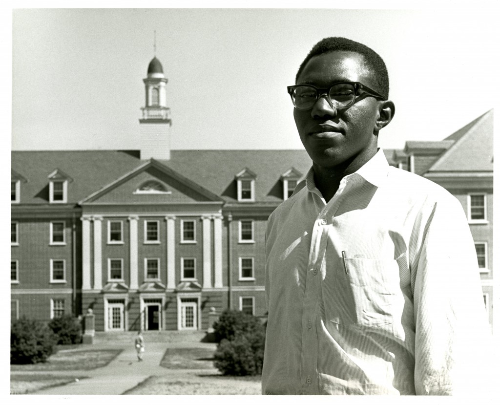 Publicity shot of Ben Nzengu, 1962. The caption on the back of the photo reads: "“In background Belk Hall, Davidson’s largest dormitory. Ben lives on the 4th floor with J. Knox Abernethy, Jr., a senior and son of Rev. J.K. Abernethy…”