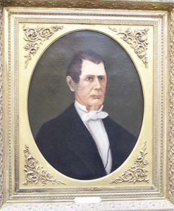 Davidson's first president as painted by his daughter. in a golden picture frame