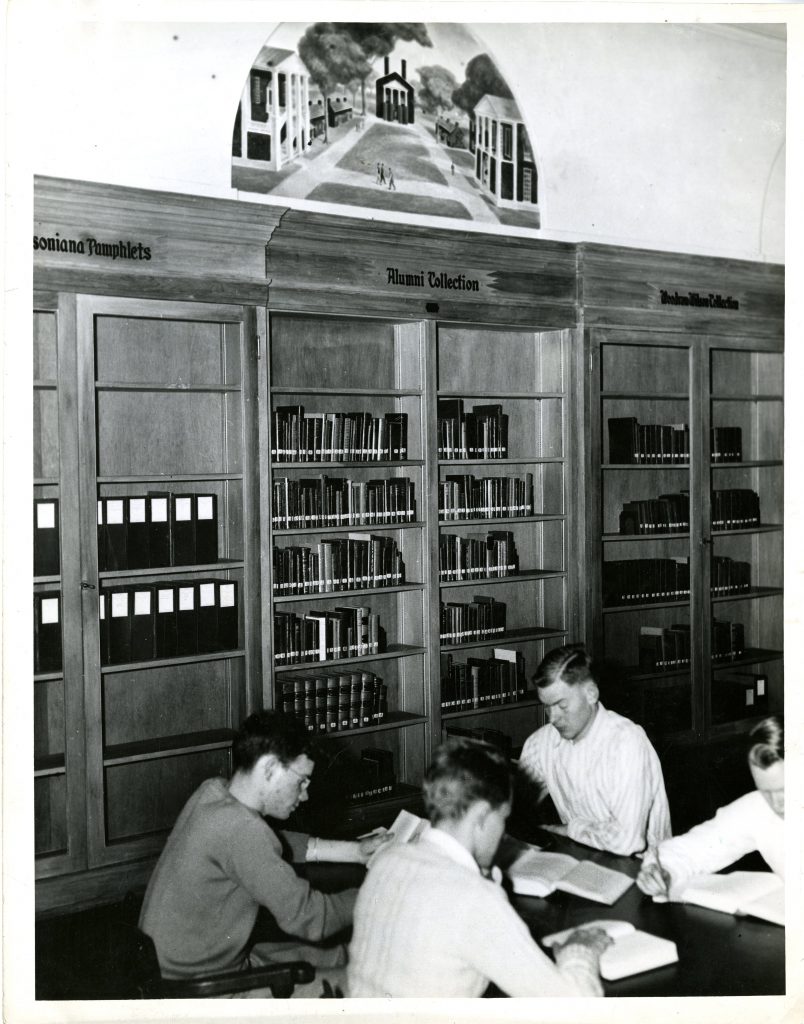 Students working at a table in the old Davidsoniana room in Grey Library, date unknown.
